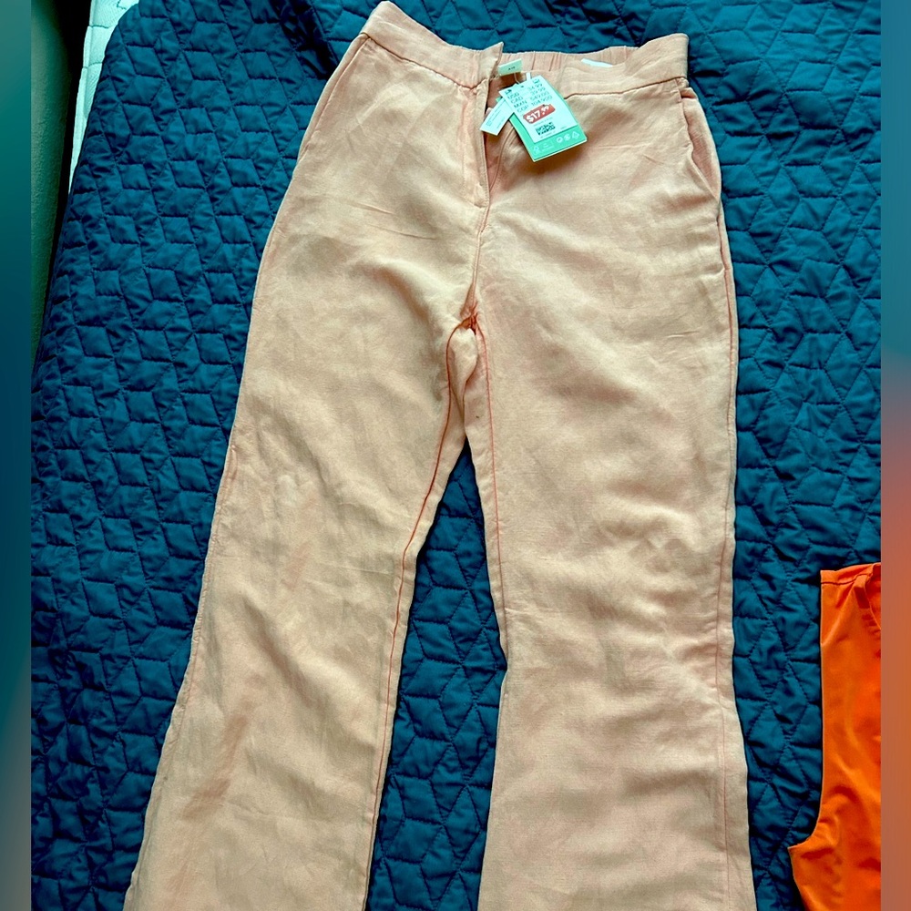 Light pink, boot cut, high-waist trousers